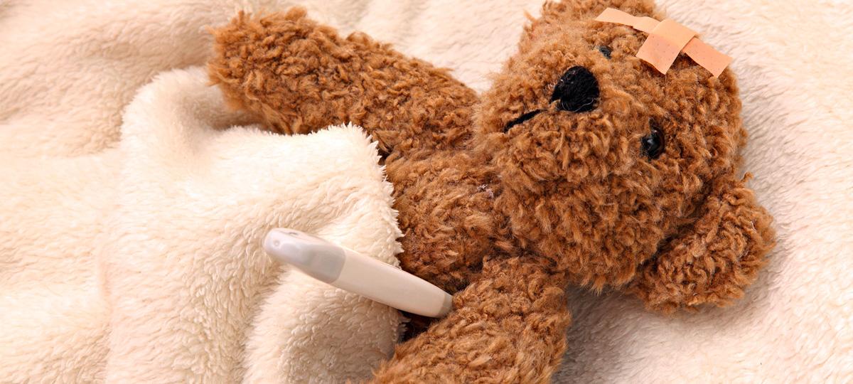 плюшевый медведь с градусником