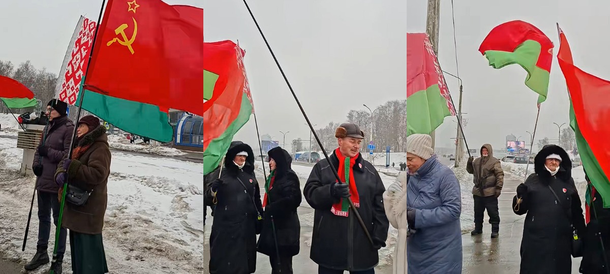 митинг с красно-зеленым флагом и коммунистическим флагом